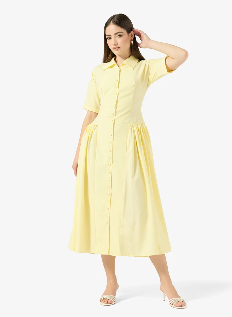 جينجر فستان بقصة ضيقة وواسعة بأزرار